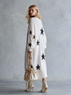 SOFIA - Maxi dress in maglia avorio con stelle oversize