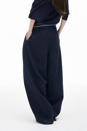 LOREDANA - Pantaloni wide-leg gessati dalla linea curva