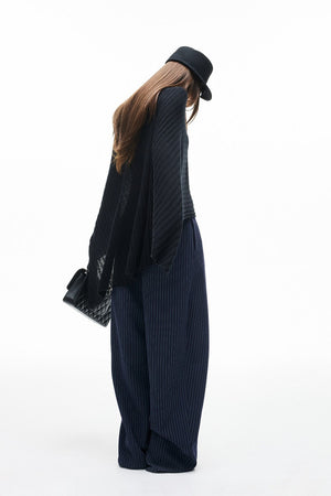 LOREDANA - Pantaloni wide-leg gessati dalla linea curva